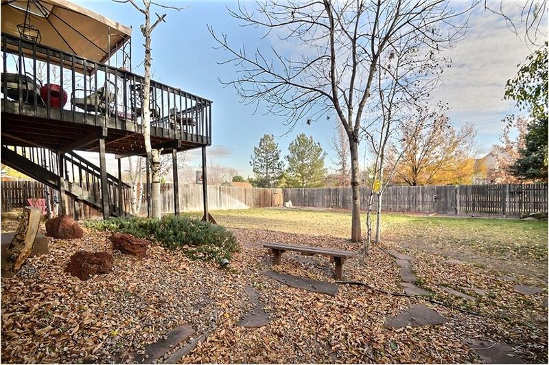 Spacious backyard with patio & deck