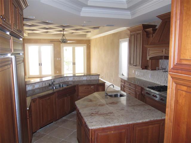 Kitchen with Custom Cabinets and Granite Counters