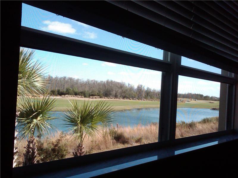 View of pond and golf course from master bedroom window
