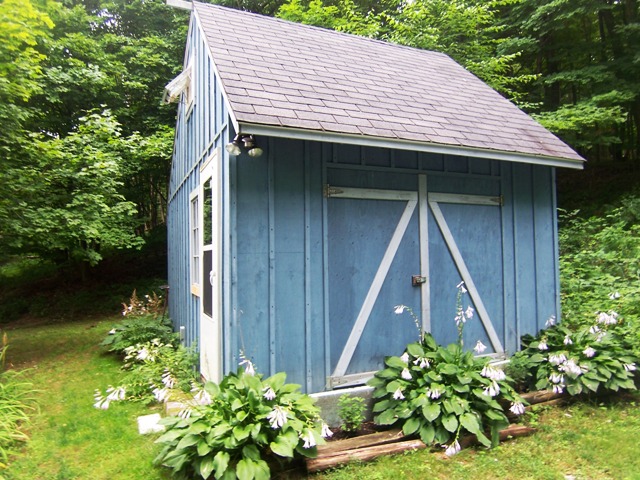 Shed with overhead storage