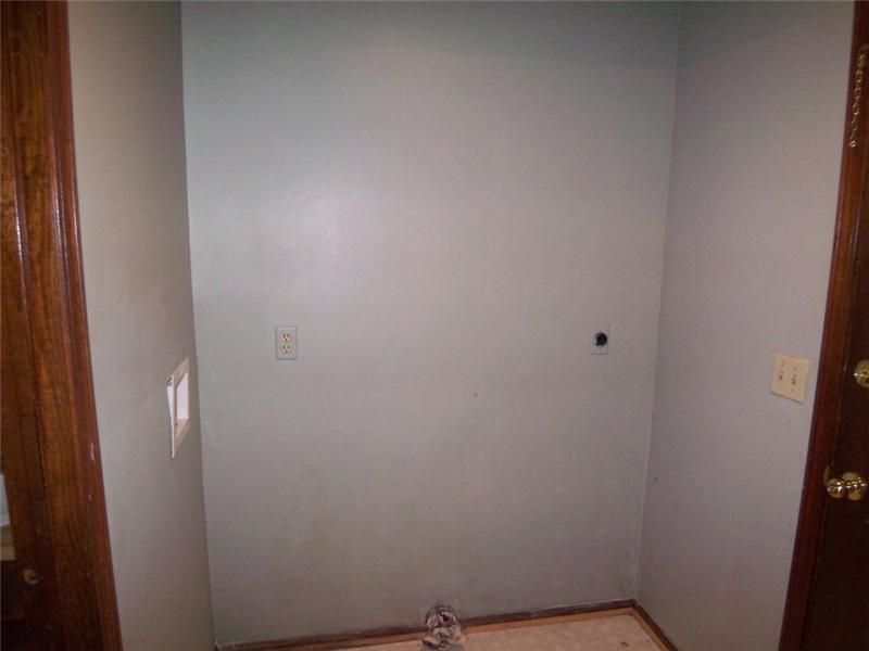 Convenient Laundry Room Off Kitchen