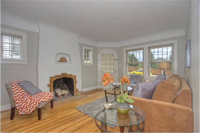 Fireplace on Main Level, with gorgeous wood floors!