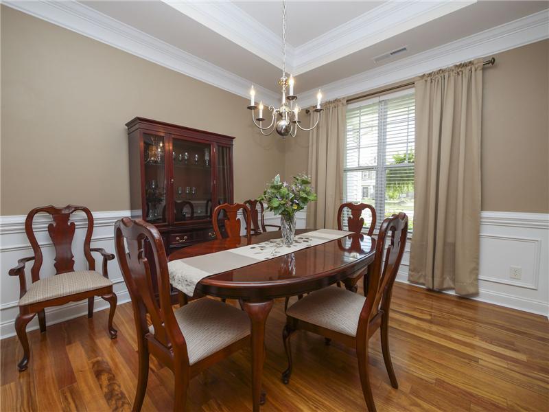 Elegant moldings and teak flooring