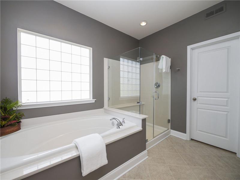 Frameless glass enclosure on big shower