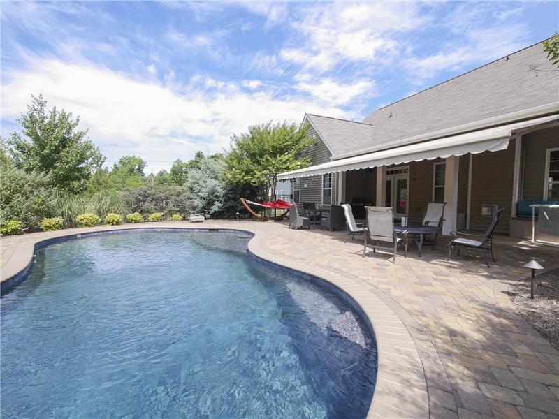 Paver patio surrounds pool