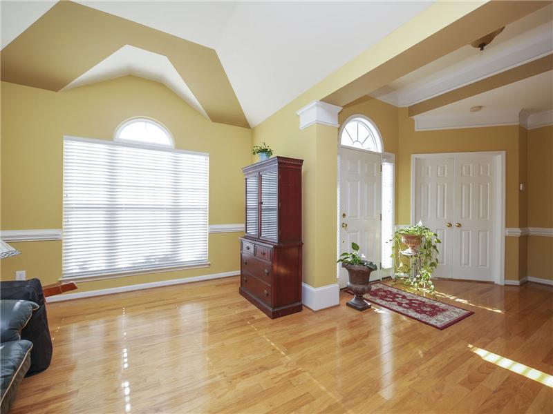 Wood flooring in formal dining, entry, office and great room