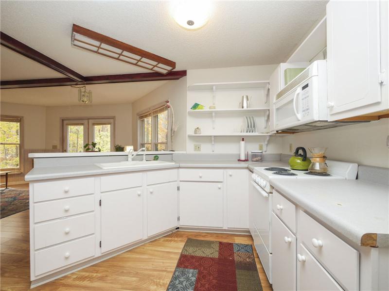 White kitchenette in main level suite