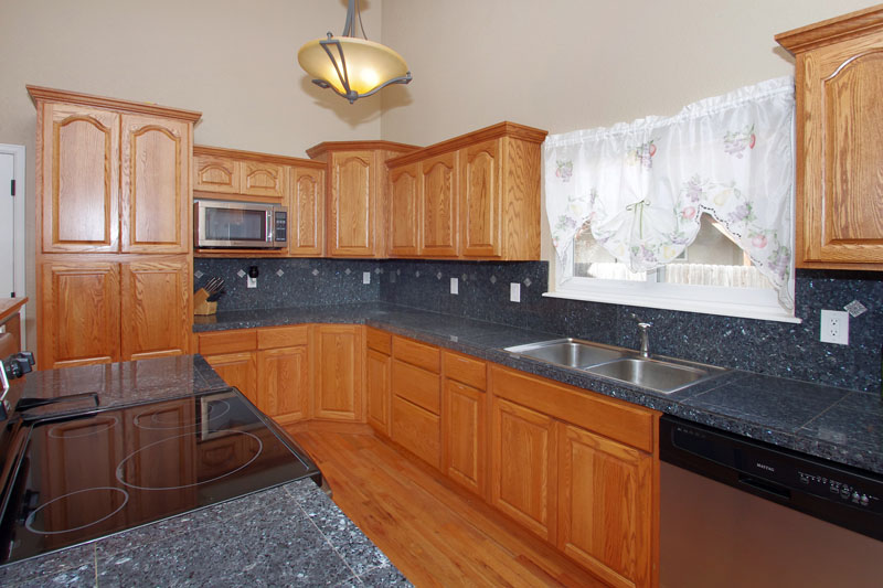 Plenty of storage with pantry, roll out shelving on the island, and a Lazy Susan!