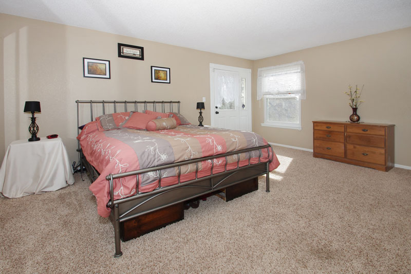 Spacious master with adjoining bath and walks out to deck