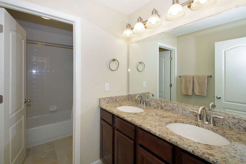 Upper level full bath with double sinks
