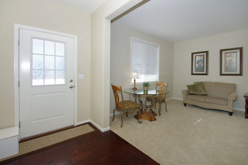 Entry with hardwood flooring