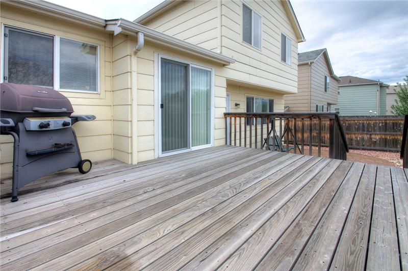 Enjoy mountain and Pikes Peak views from the 15 x 11 wood deck