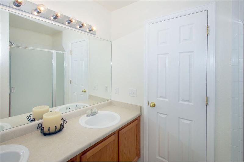 Master bath with double sinks and shower