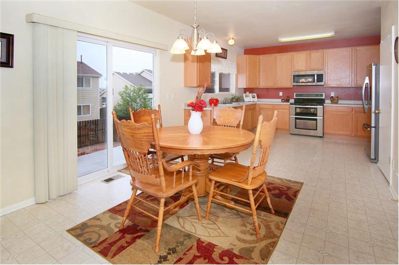 Eat in kitchen walks out to the backyard