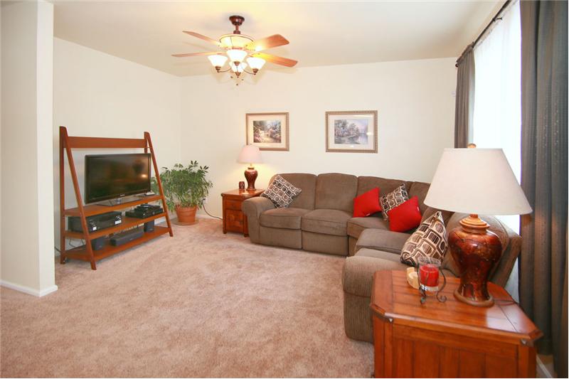 Family room with ceiling fan