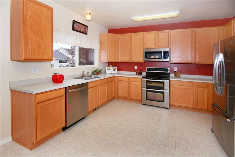 Kitchen with stainless steel appliances and double oven