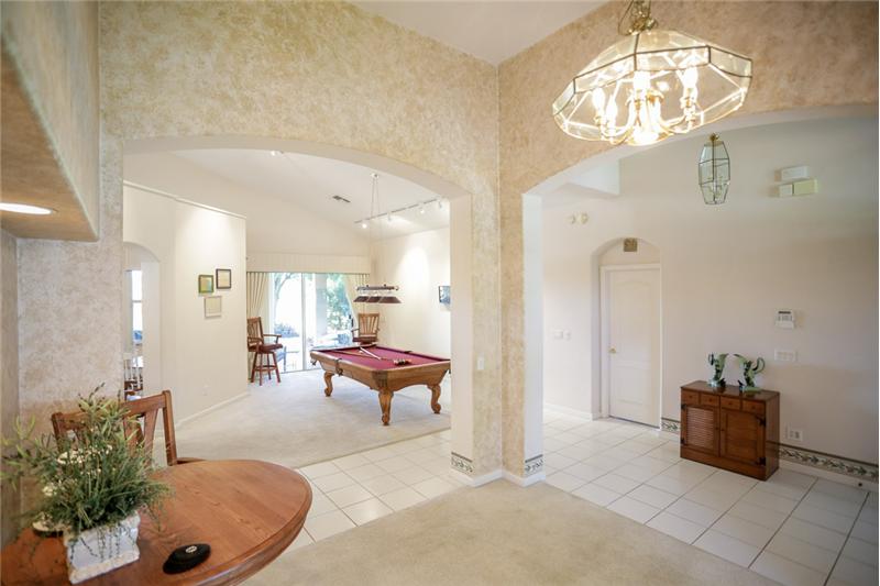 Dining room showing the foyer and living room