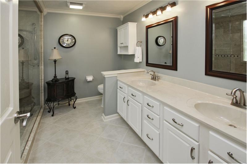 Master bath has double sinks & linen closet.