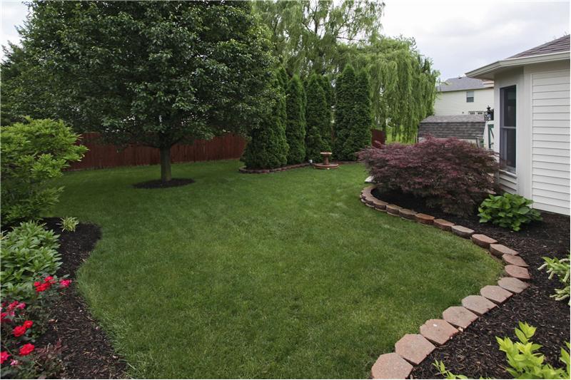 Lush lawn w/landscapping