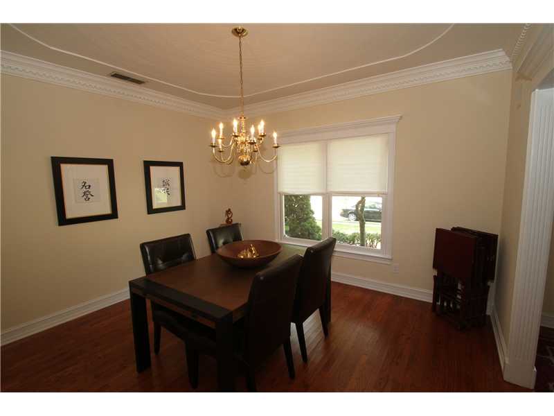 Dining room, trey ceiling & hardwood floors.