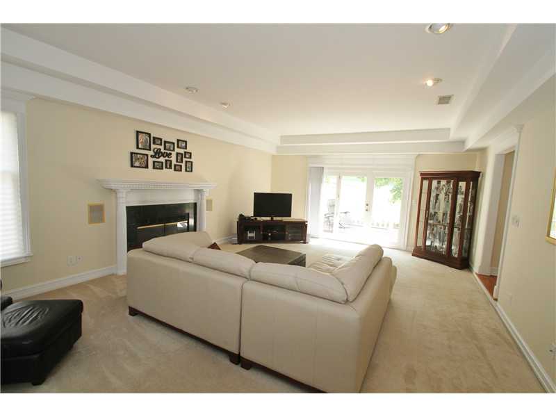 Great room w/trey ceiling, fireplace & surround sound.