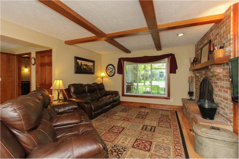 Family room with beamed ceiling.