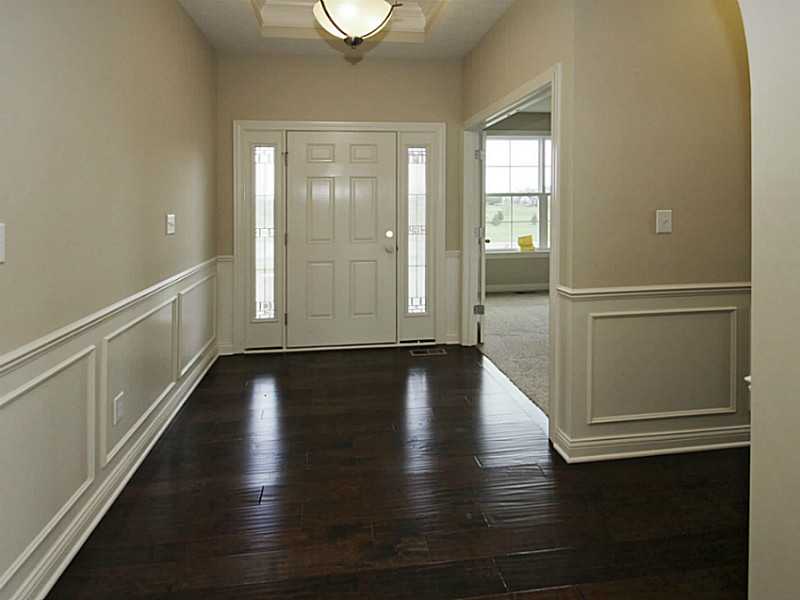 Beautiful foyer, hardwood floors & mill work