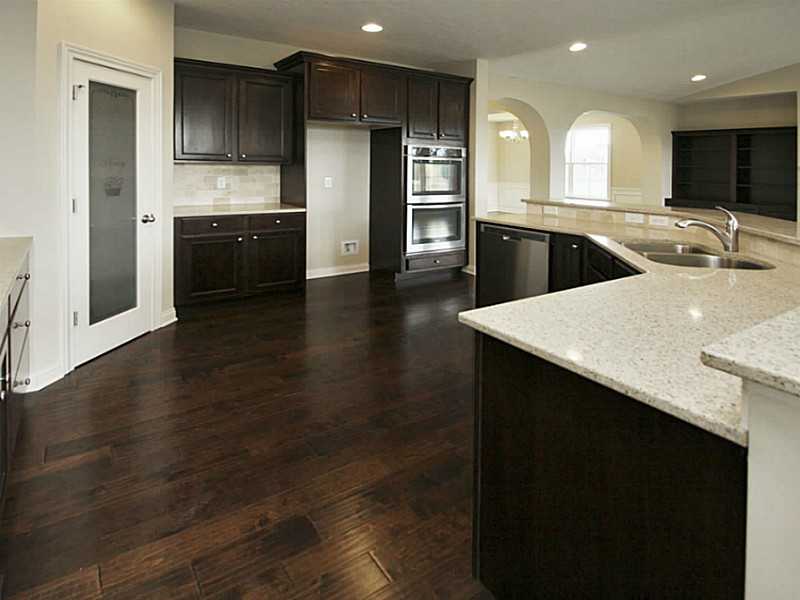 Open gourmet kitchen, walk-in pantry, SS appliances to include double oven, micro wave & dishwasher..