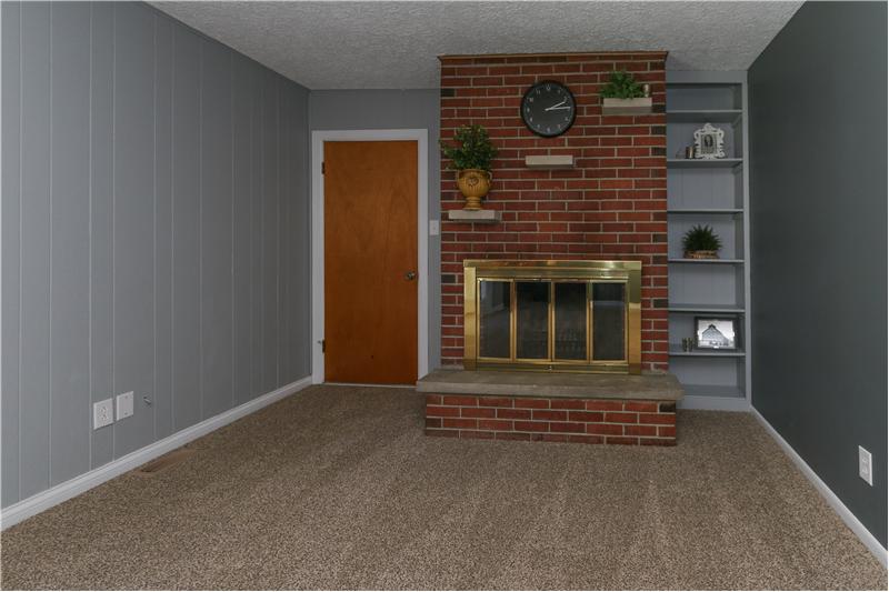 Wood burning fireplace in family room