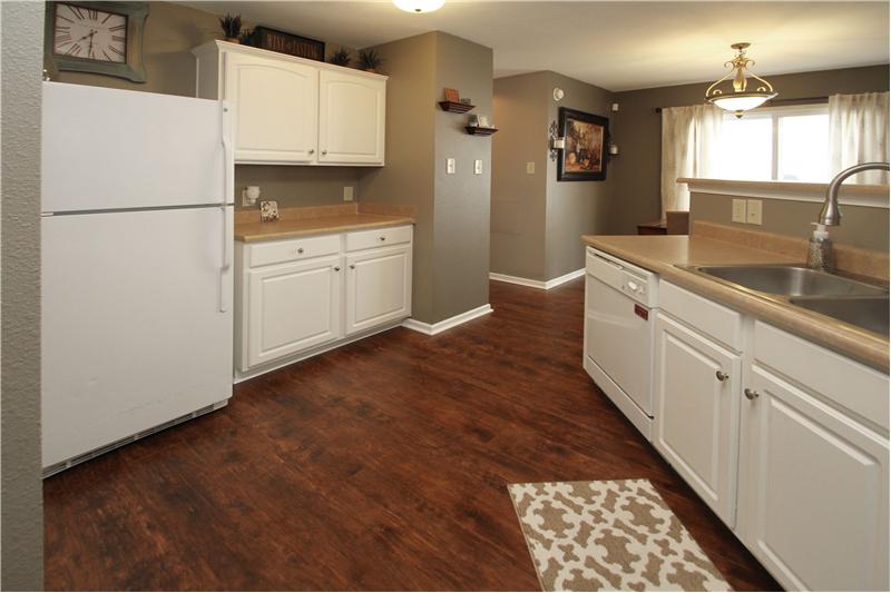 Breakfast bar on other side of sink area.