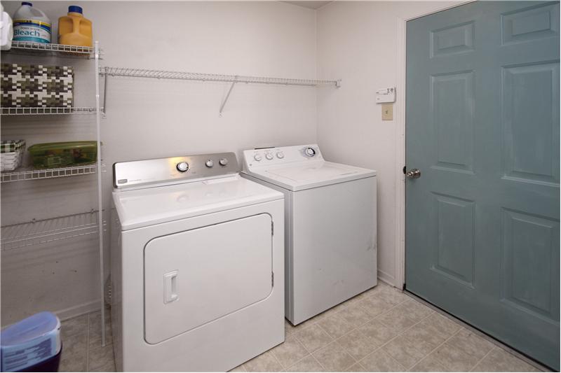 Laundry room w/storage/pantry.