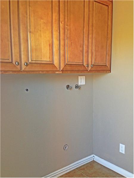 Seperate Laundry Room with Backyard Entrance