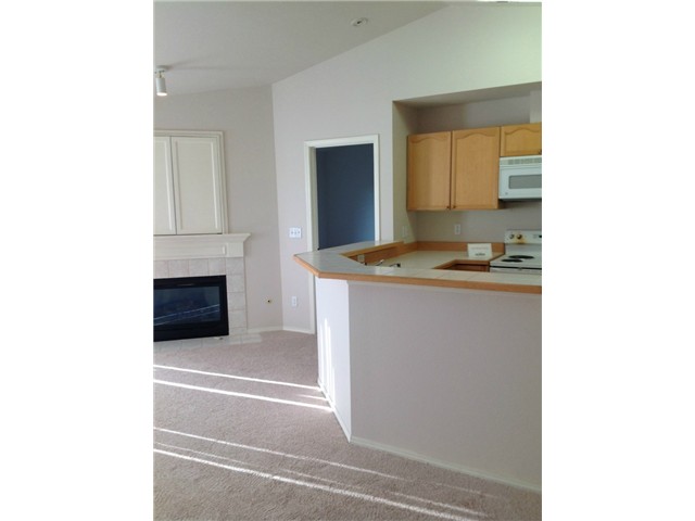 Living Room has Gas fireplace and over the mantel TV Cabinet