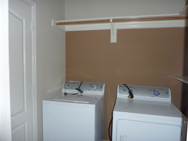 A separate utility room with washer and dryer included.
