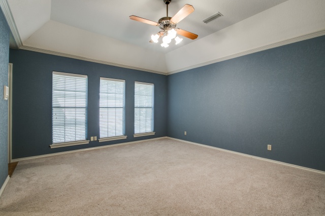 The master bedroom is located downstairs along with a guest room.