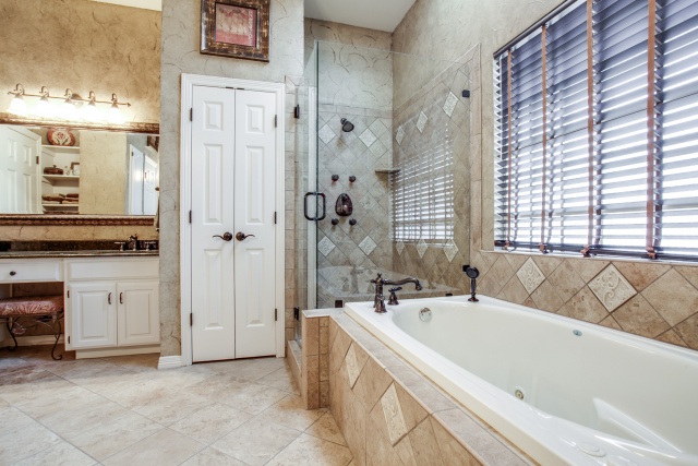 Relax in the jetted tub in the master bath.