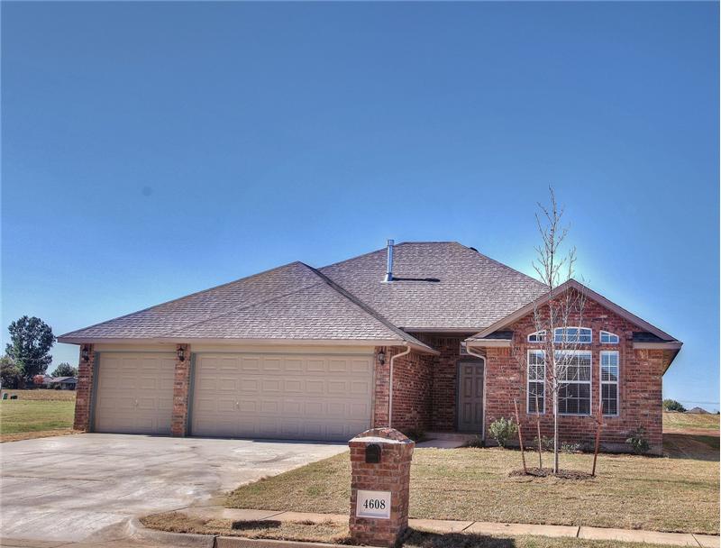 HOUSE FRONT WITH 3 CAR GARAGE