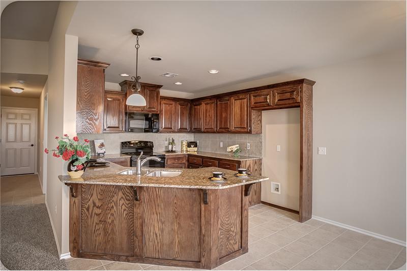 KITCHEN WITH SOLID WOOD CABINETS