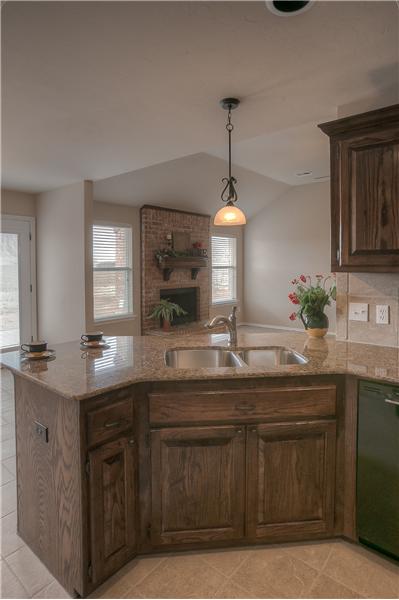 KITCHEN - VIEW TOWARD FIREPLACE 