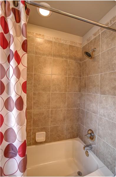 CERAMIC TILED BATH/SHOWER AREA 