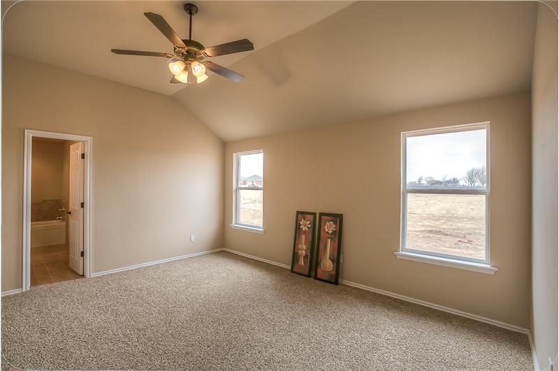MASTER BEDROOM WITH SLANTED CEILING 