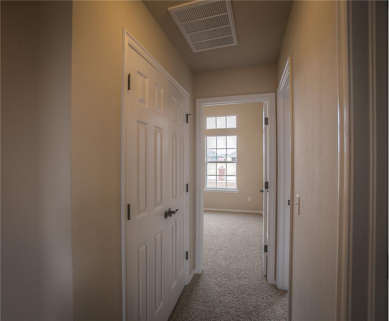HALLWAY WITH BUILT IN CLOSET