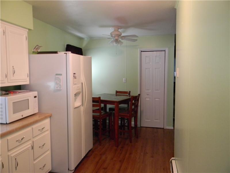 Eat-in kitchen with new laminate flooring