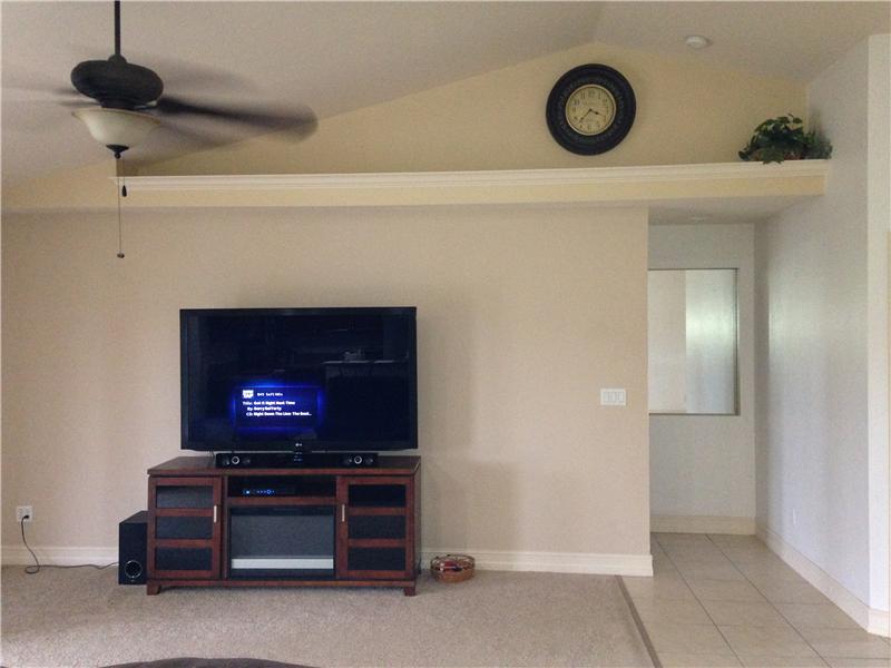Living Area with entrance to Master Bed and Bath