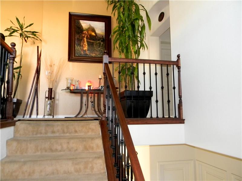 A beautiful entry with rod iron railings