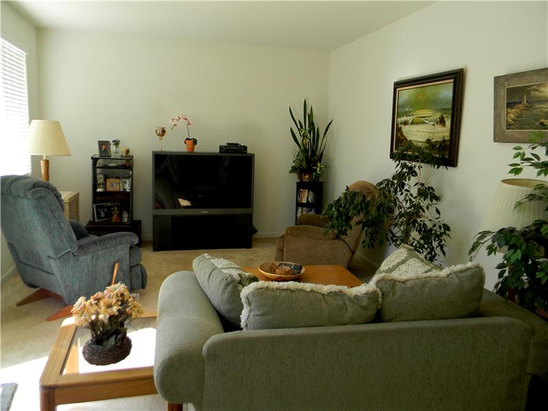 The family room downstairs is a great place for kids to play games or watch a movie