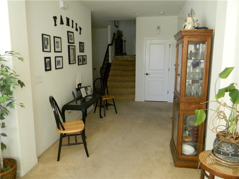 This multi-purpose area downstairs leads to the family room and more bedrooms