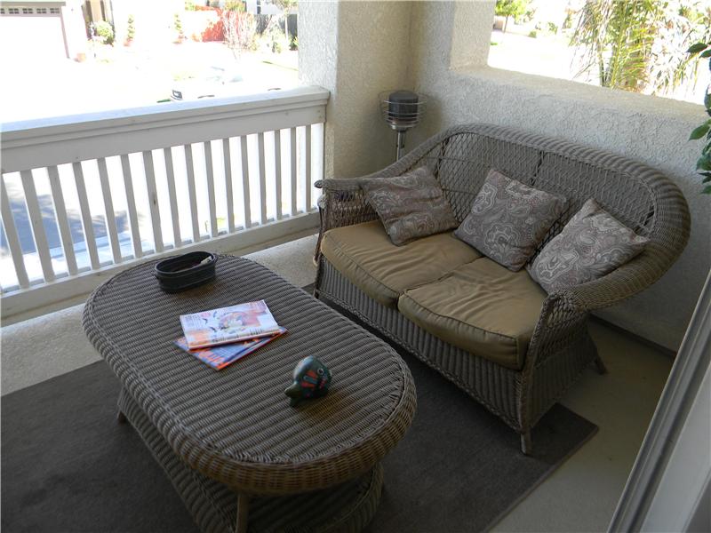 Enjoy your morning coffee here on the front balcony and watch the world pass by