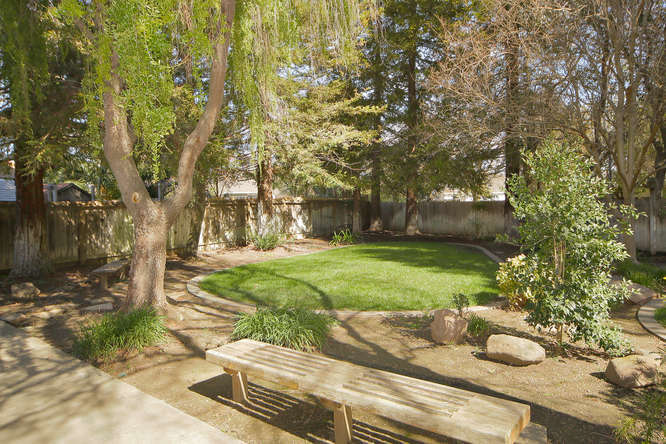 Shady and private yard backs to greenbelt
