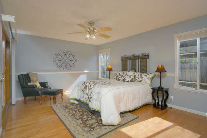 Master Suite with wood floors and large closet space